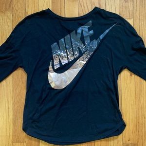 black nike shirt with rose gold wording